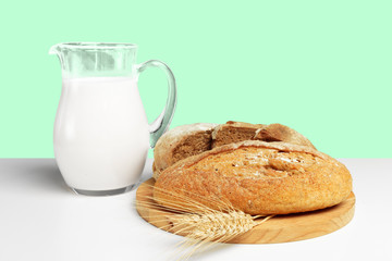 Bread and milk on the table