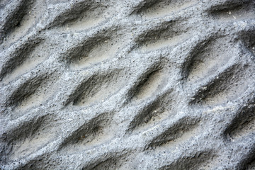 The texture of the recesses in the wall