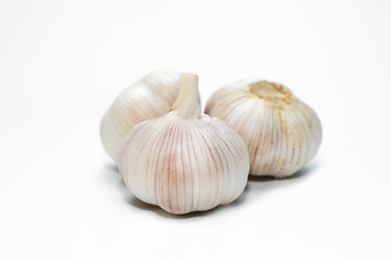 garlic cloves isolated white background