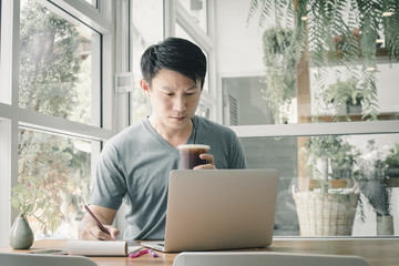 Freelancer man working online at his home. 
