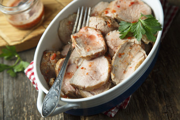 Sliced pork fillet cooked with tomato sauce