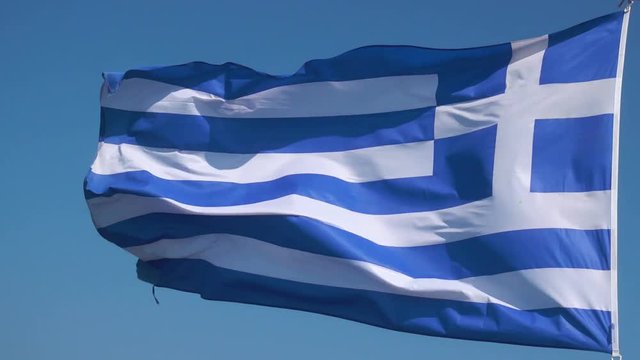 Flag of Greece - Waving greek flag agaist the blue sky