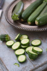 preparing baby courgette