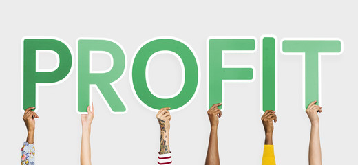 Hands holding up green letters forming the word profit