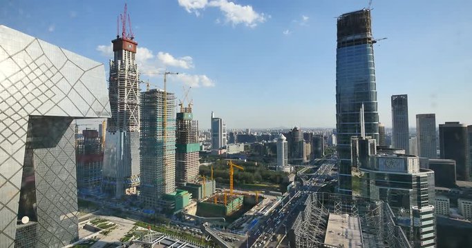 4k,Aerial View of heavy traffic through BeiJing central business district that is located in the Chaoyang district,It's the main hub for financial and business activities in China's capital city.