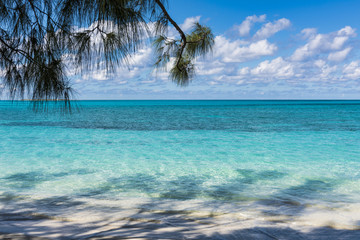 Fototapeta na wymiar One of the many islands of the Bahamas surrounded by deep blue sea