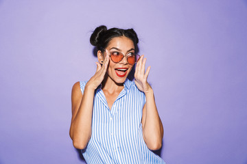 Portrait of a cheerful young woman isolated