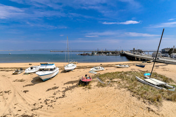 Fototapeta na wymiar Boats on the beach of Province Town Cap Code