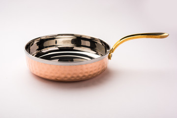 Copper Tarka/Tadka Fry pan with handle also can be used as a stylish serving bowl - obrazy, fototapety, plakaty