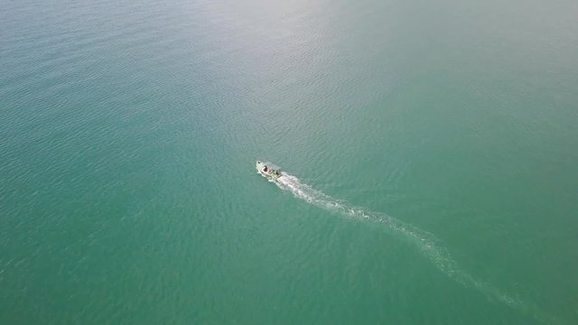 Aerial view. Motor boat floats in the sea