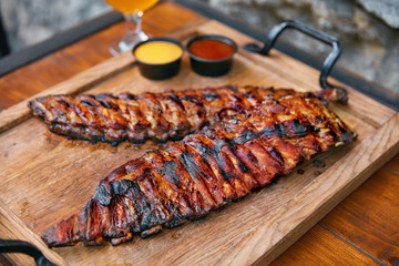 Food Closeup. Grilled Ribs In Barbecue Restaurant