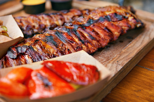 Food Closeup. Grilled Ribs In Barbecue Restaurant