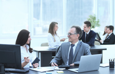 Businessman analyzing investment, budget and income charts at his workplace
