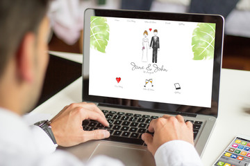 businessman browsing wedding website with computer - obrazy, fototapety, plakaty