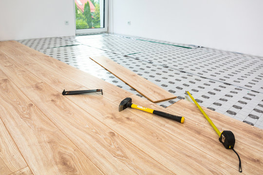 Instalation of new wooden floor at home