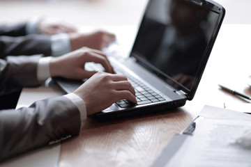 close up.businessman working on the laptop