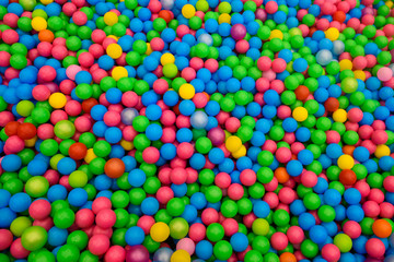 Colored plastic small balls. Lots of multi-Color fun balloon.  