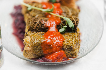 vegan gluten-free stuffed cabbage with millet and forest mushrooms, red onion jam
