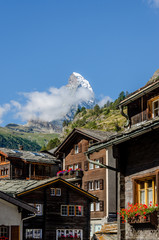 Houses in Zermatt and the top of the Matterhorn