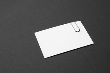 business card empty with paper clip