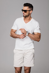 Handsome man in summer clothes wear sunglasses