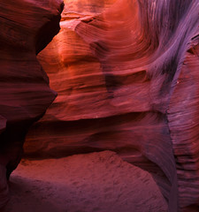 Colorful textured slot canyon near Page known as Waterhole Canyon, Arizona