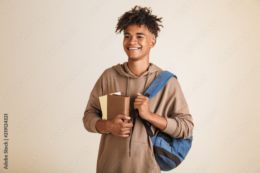 Wall mural Portrait of a joyful young afro american man