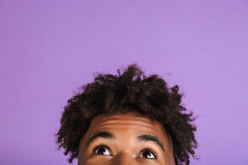 Half face portrait of a young afro american man isolated