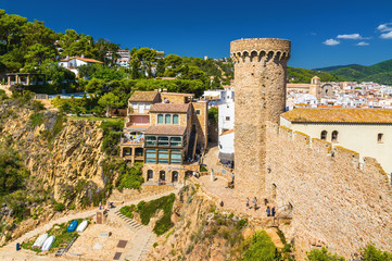 Sunny view of fortress Tossa de Mar at the coast of  Mediterranean sea, Girona province, Spain.