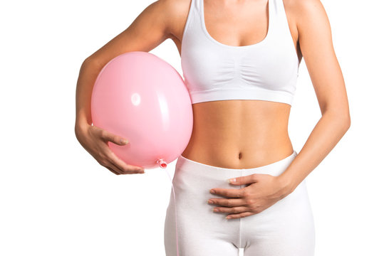 Woman Holding A Balloon, Feeling Bloated Concept  