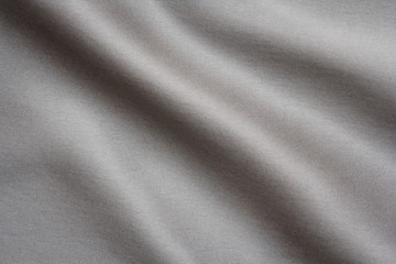 textuur van grijze stof met grote plooien, abstracte achtergrond