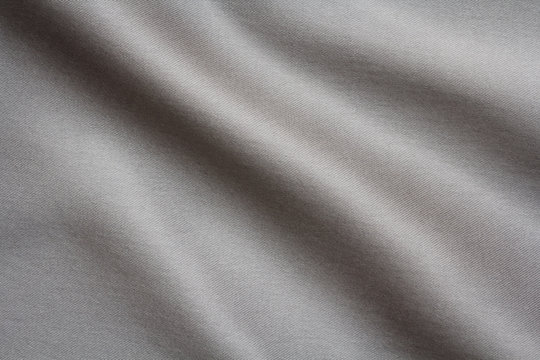 Fototapeta texture of gray fabric with large folds, abstract background