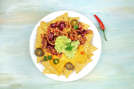 Nachos with cheese and chilli, traditional Mexican snack, with a place for text
