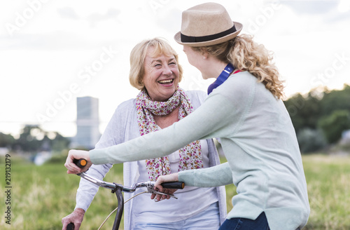 Grandmother and granddaughter having fun together