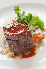 plated beef rib meal