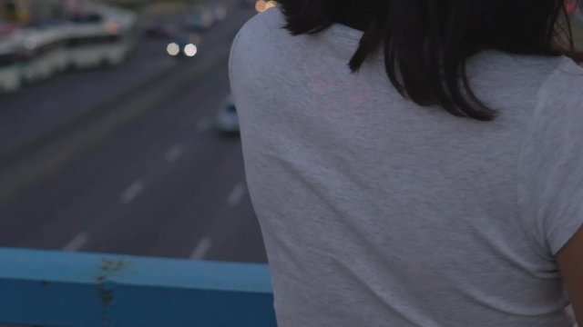 young dysfunctional teenage girl walking along the track. HD slowmotion