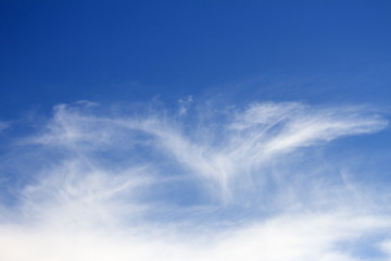 Naklejka na ściany i meble Sky clouds background. Cumulus white clouds in the dark blue sky in the morning