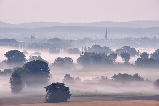 Germany, Baden-Wuerttemberg, Constance district, Radolfzell, view to Radolfzeller Aach in the morning with fog