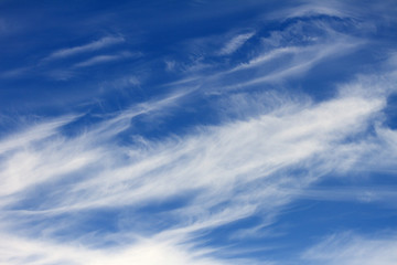 Spindrift clouds. Blue sky in the morning