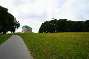 Obraz premium Dyrehaven is a forest park north of Copenhagen. It covers around 11 km². Dyrehaven is noted for its mixture of huge, ancient oak trees and large populations of red and fallow deer.