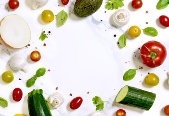 Fresh vegetables, arrangement on a white marble background with copy space.