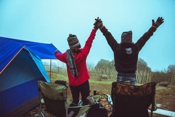 Lover woman and man asians travel relax. camping in the holiday. On the Moutain.Thailand