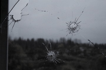 Traces of shots on the glass