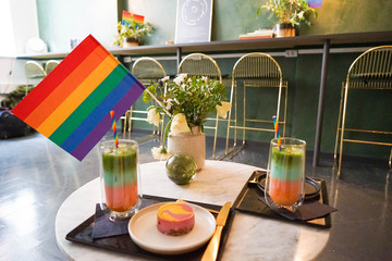 Gay Pride Food in Cafe With Rainbow Flag