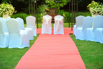 Many wedding chairs with white elegant covers