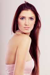 Fototapeta premium Brunette long hair woman wearing pearls necklace