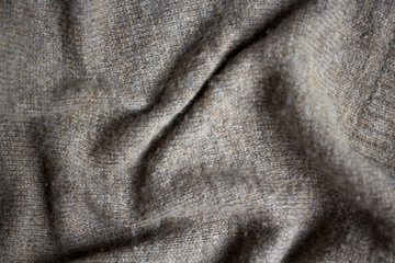 Obraz premium the texture of a knitted sweater, close up warm woollen clothing