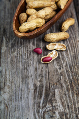 Peanuts in a wooden bowl