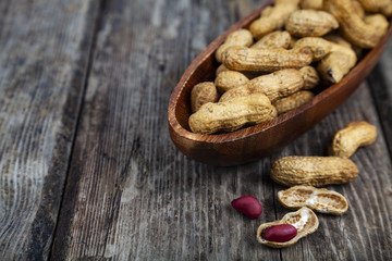Peanuts in a wooden bowl