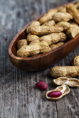 Peanuts in a wooden bowl